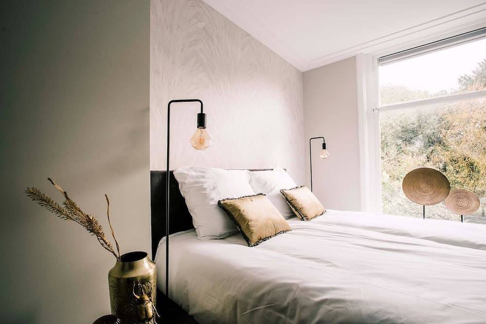 Geheel appartement, Verblijf bij Bed en Koffie in het hart van Tilburg Centrum. Dit moderne appartement van 85 m² is ideaal voor een citytrip, zakelijk verblijf of Efteling overnachten wanneer je comfortabel een appartement wilt huren in Tilburg. in Tilburg, Noord-Brabant