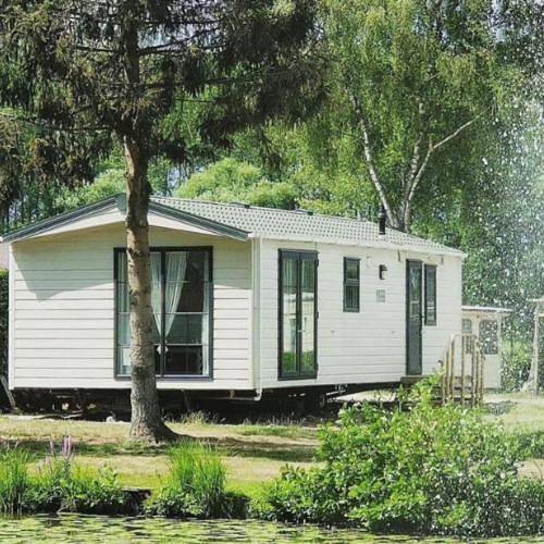 Ferienhaus für 4 Personen, mit Terrasse und Seeblick sowie Ausblick und Garten