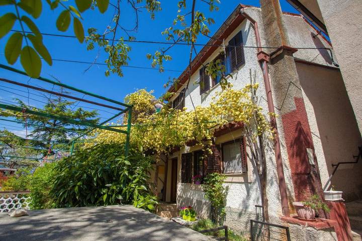 Ferienhaus für 4 Personen, mit Terrasse und Garten