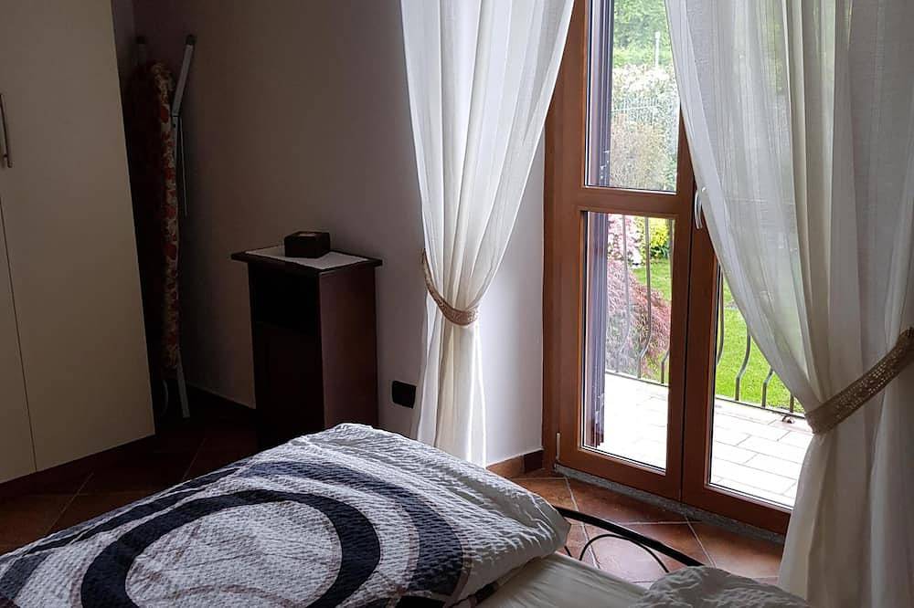 Geheel appartement, Comfortabel appartement met privétuin nabij het Ortameer en Milaan in Pella, Gemeente Pella