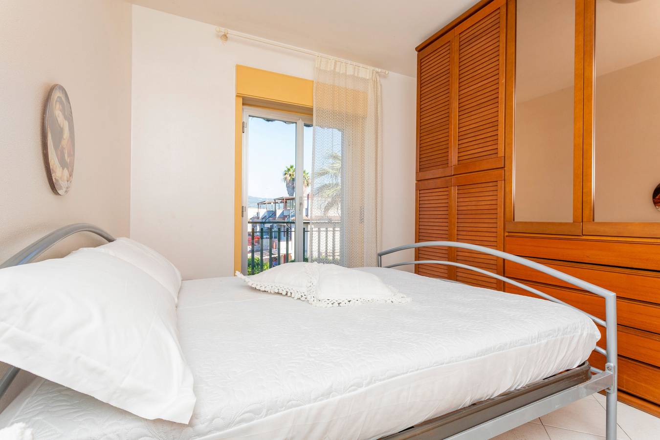 Apartamento entero, Apartamento 'I Ciottoli Dello Ionio - Apt 5' con vistas a las montañas, terraza compartida y balcón in Fondachello, Provincia de Catania