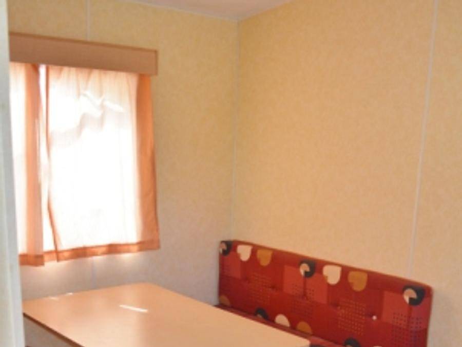 Camping Le Saulou - Mobilhome 4 personnes - Mobil Home A 4P sans sanitaire (+ 15 ans) in Monceaux-sur-Dordogne, Région de Tulle