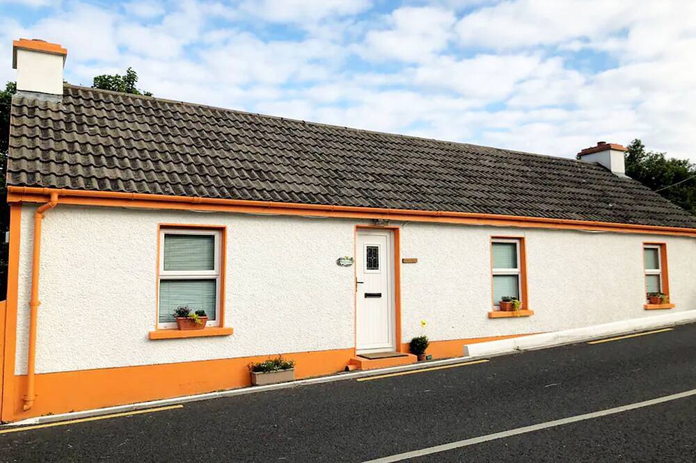 Teach Condy's Cottage nestled at the bottom of Sliabh Liag Cliffs, Co. Donegal in Donegal, County Donegal