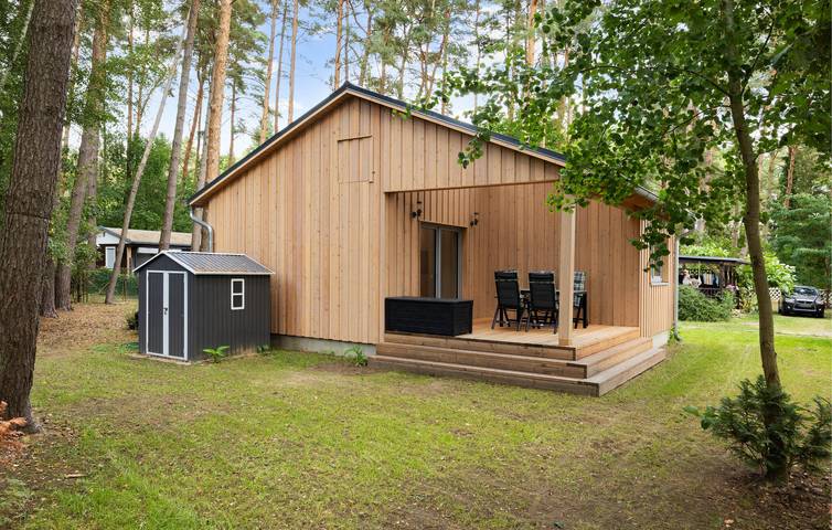 Ferienhaus für 4 Personen, mit Terrasse und Garten sowie Seeblick an der Müritz