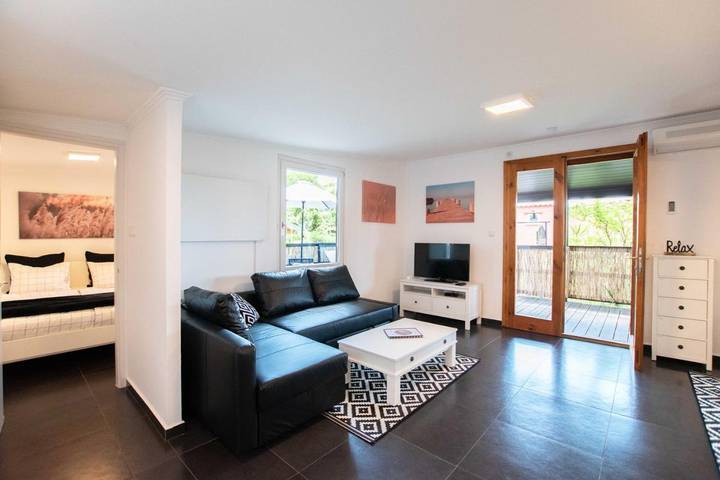 Ferienhaus für 4 Personen, mit Terrasse und Ausblick in Weiden am See