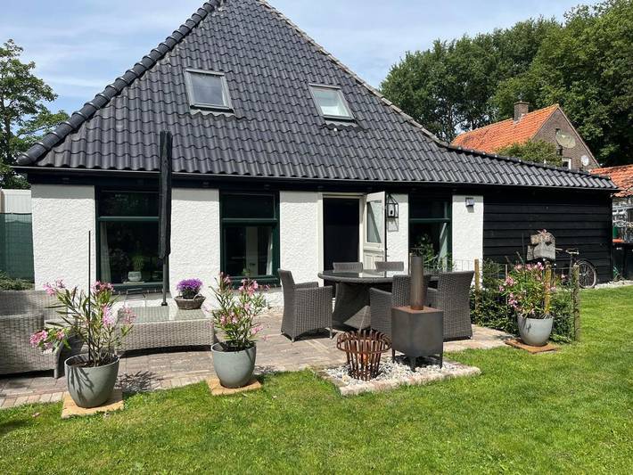 Appartement de vacances pour 4 personnes, avec jardin ainsi que vue et sauna