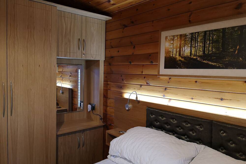 Luxury pine log cabin positioned within the mountains of the Lake District in Skelwith Bridge, Lake District