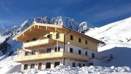 Hütte für 6 Personen, mit Ausblick und Garten sowie Sauna und Balkon, mit Haustier in Jochberg
