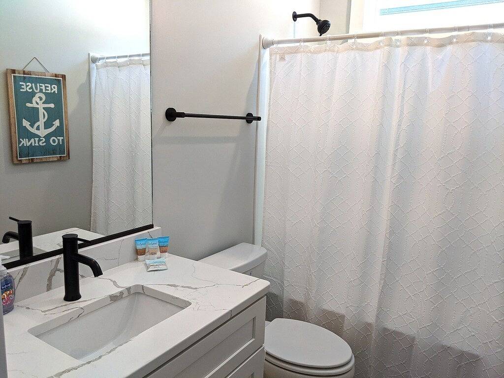 Lighthouse Views, Beach Parking Pass, & Furry Family Members Welcomed in Corolla, Currituck County