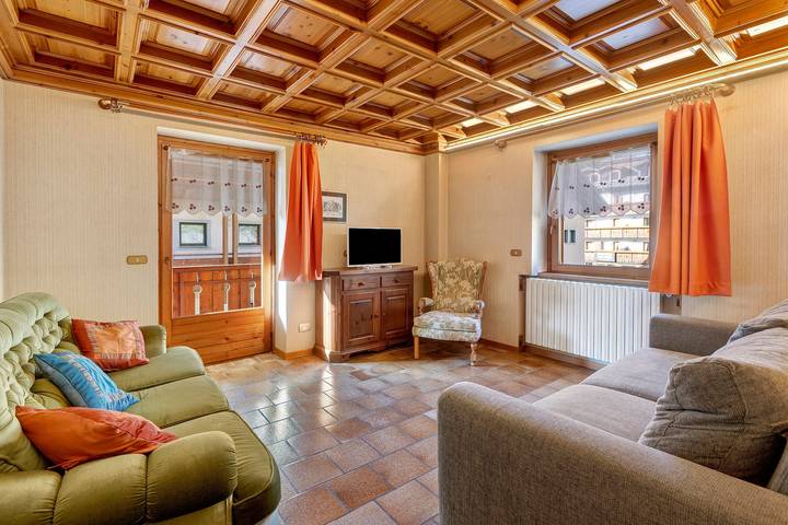 Chalet per 8 persone, con giardino e balcone in