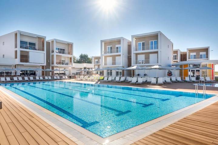 Apartament wakacyjny dla 4 osób, z Balkon i Taras oraz Ogród i Basen dla dzieci w Cavallino