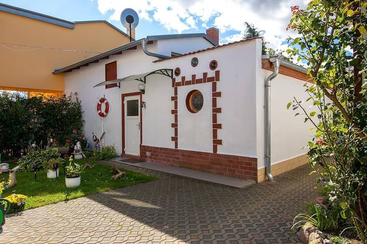 Bungalow für 2 Personen, mit Garten