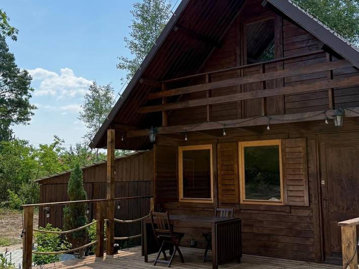 Domek letniskowy dla 4 osób, z Balkon i Taras oraz Ogród i Widok w Województwo łódzkie
