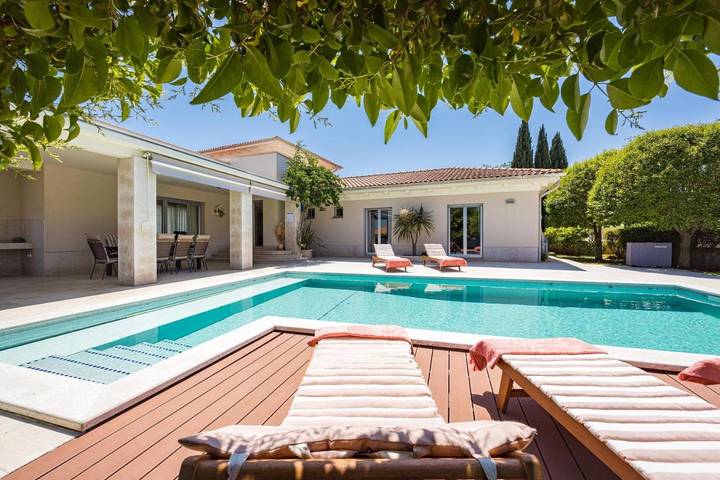 Villa per 12 persone, con Balcone e Terrazza nonché Giardino e Piscina a Olmi