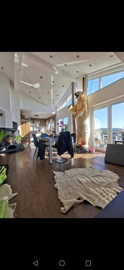 Ferienwohnung für 3 Personen, mit Terrasse und Garten sowie Ausblick in Münsingen