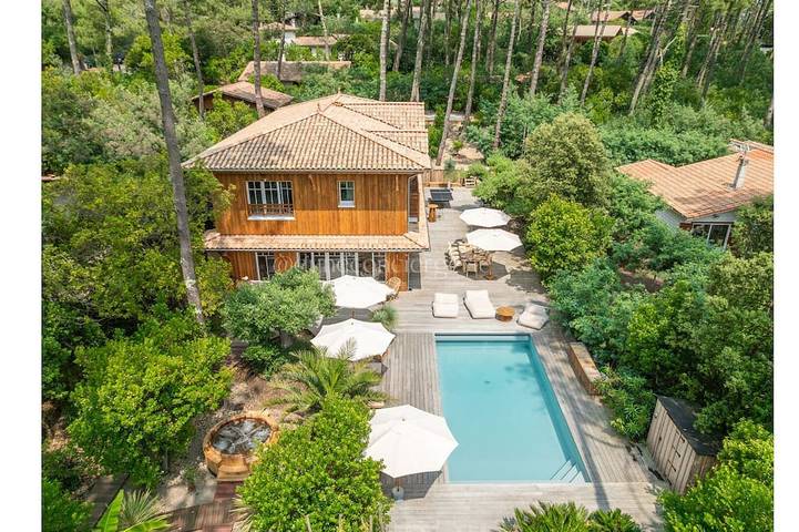 Location de vacances pour 12 personnes, avec jacuzzi ainsi que balcon et jardin dans Plage Du Truc Vert Cap Ferret