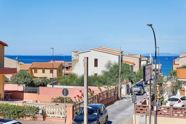 Holiday Home 'La Perla Bianca' with Sea View, Balcony, and Air Conditioning in Lu Bagnu, Castelsardo