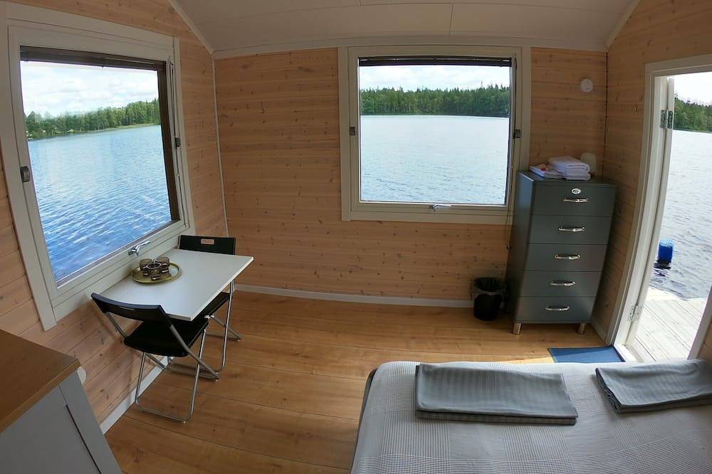 Cozy Tiny Houseboat in the Nature in Jönköpings län