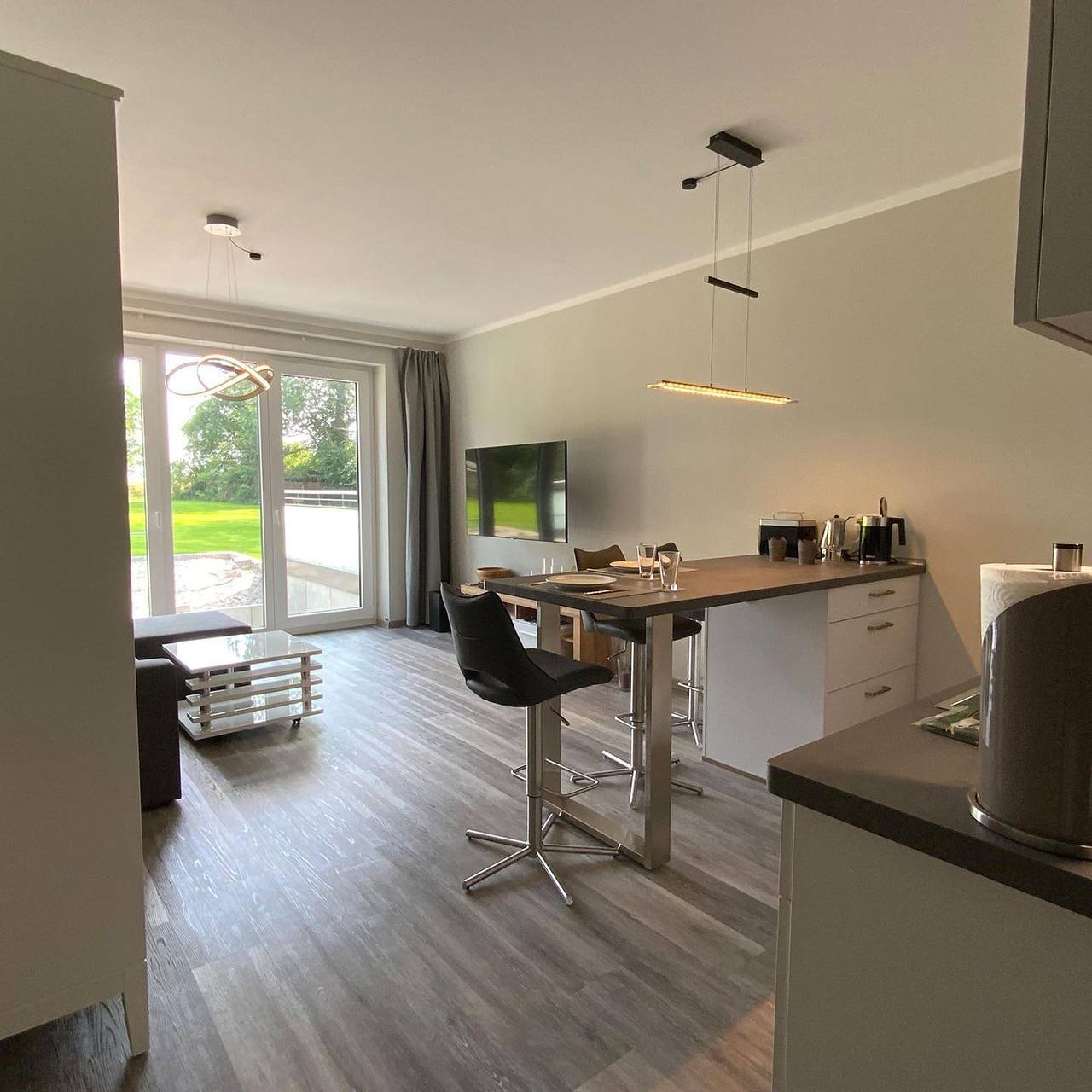 Ganze Wohnung, Modernes Apartment in Petersdorf mit Gartenblick und hochwertiger Ausstattung in Westfehmarn, Petersdorf auf Fehmarn