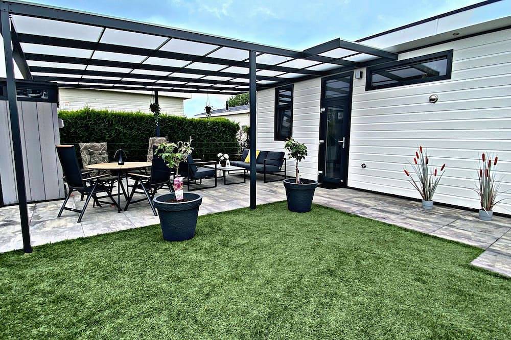 Luxchalet „Vaju Lathum“ am See Strand Pool Park Nationalpark Lathum Arnhem in IJssel