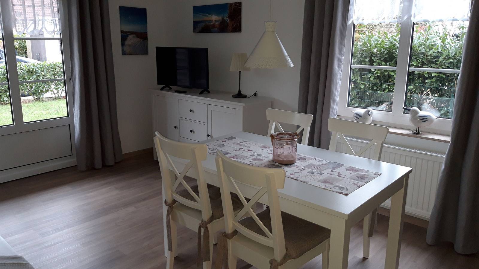 Appartement entier, Appartement 'Fewo Wittesand' avec terrasse commune, jardin commun et Wi-Fi in Hooksiel, Côte sud de la mer du Nord