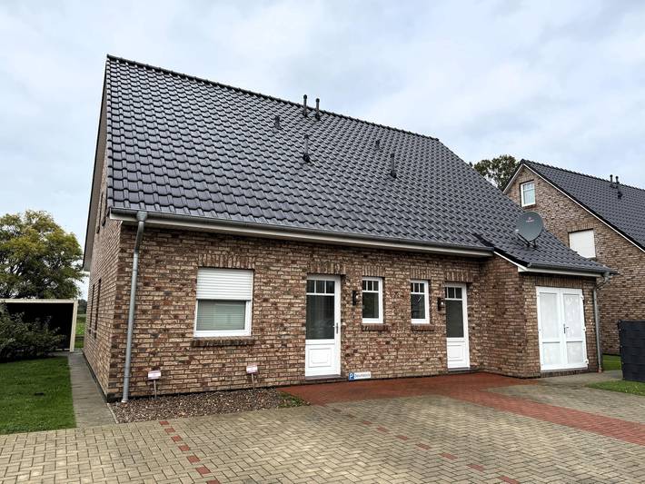 Ferienwohnung mit Meerblick für 4 Personen, mit Terrasse und Garten in Neßmersiel
