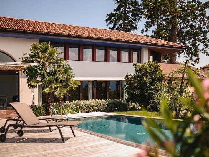 Ferienhaus für 10 Personen, mit Balkon und Terrasse sowie Garten und Sauna am Kalterer See