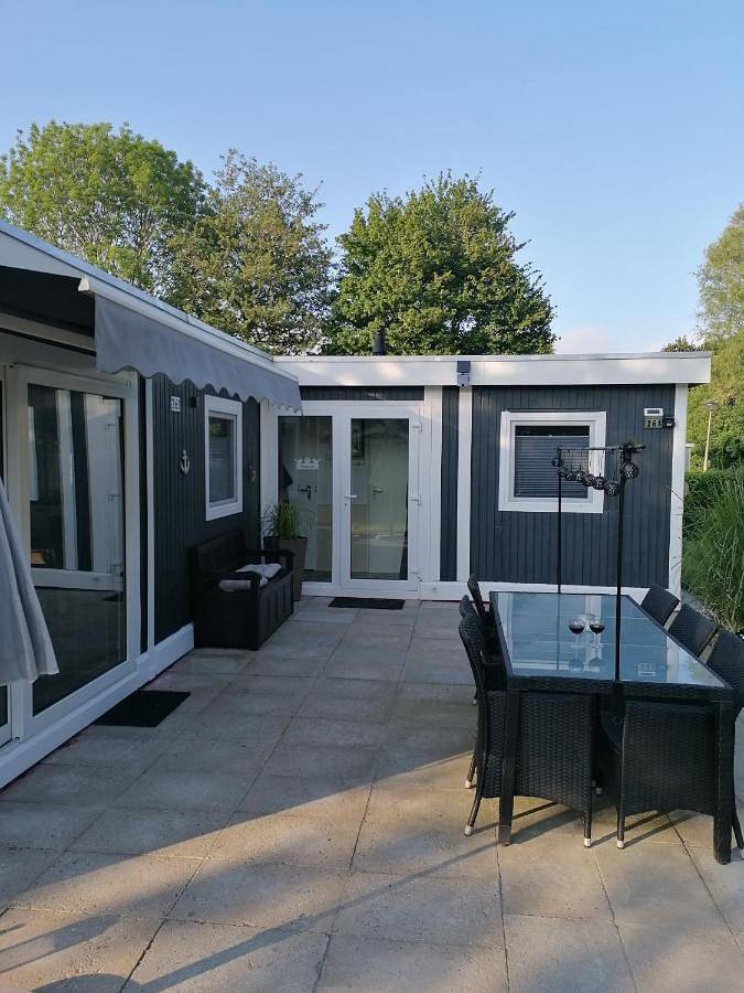 Appartement de vacances pour 4 personnes, avec bassin pour enfant et terrasse ainsi que jardin et vue
