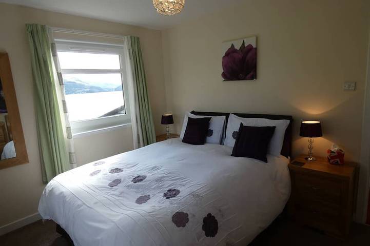 Lochside with beach access uninterrupted views of spectacular Highland Mountains in Highlands