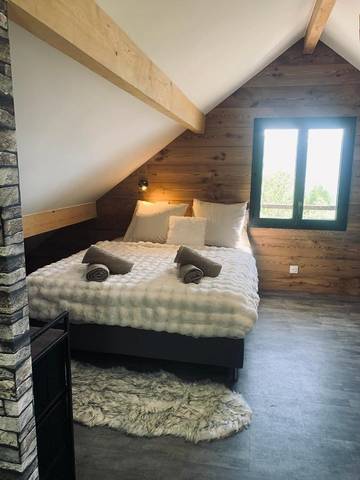 Gîte pour 2 personnes, avec vue sur le lac ainsi que jardin et vue à Saint-Sauveur