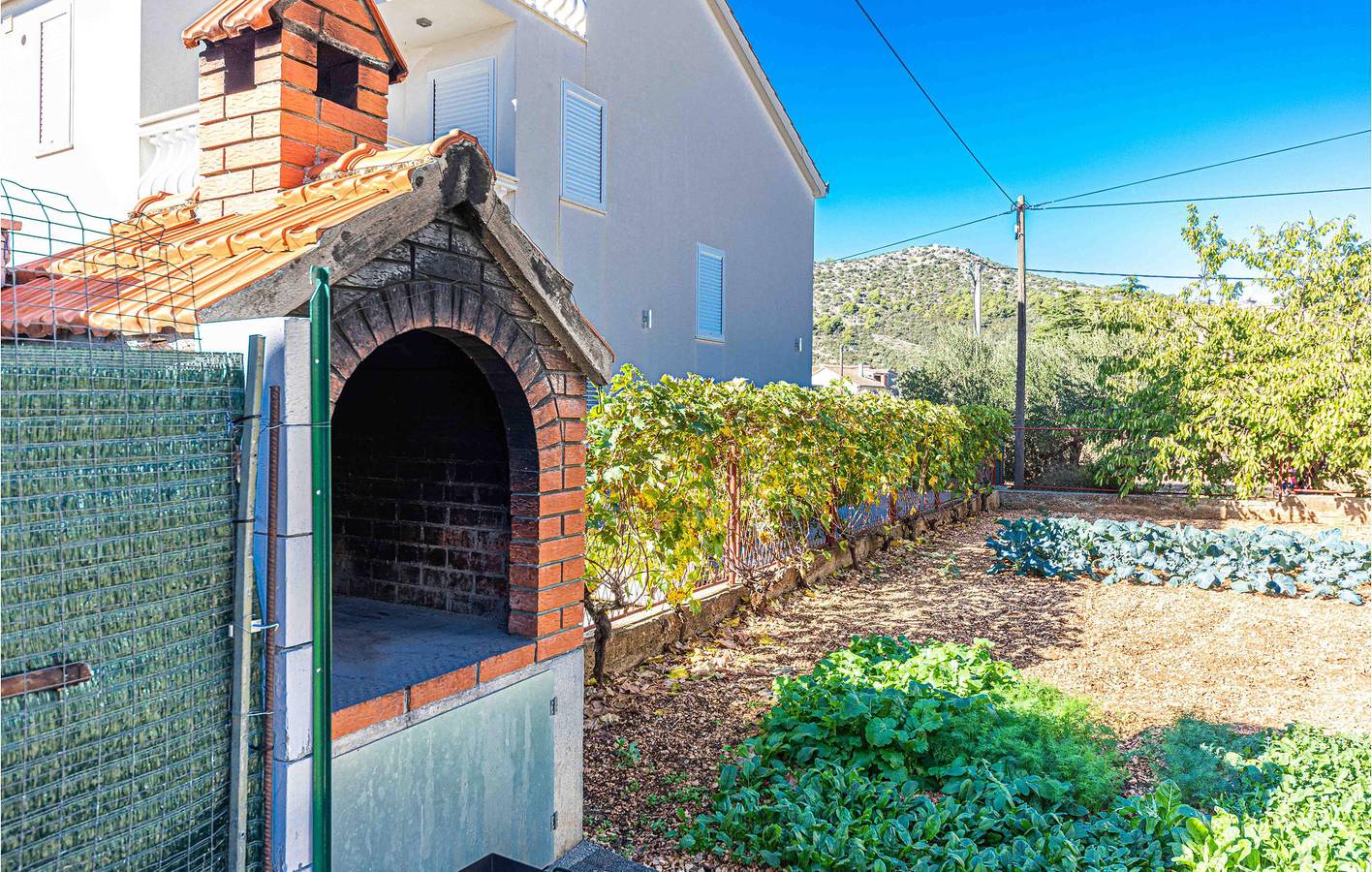 Geheel vakantieappartement, Vakantieappartement voor 4 personen met tuin in Poljica, Split-Dalmatië