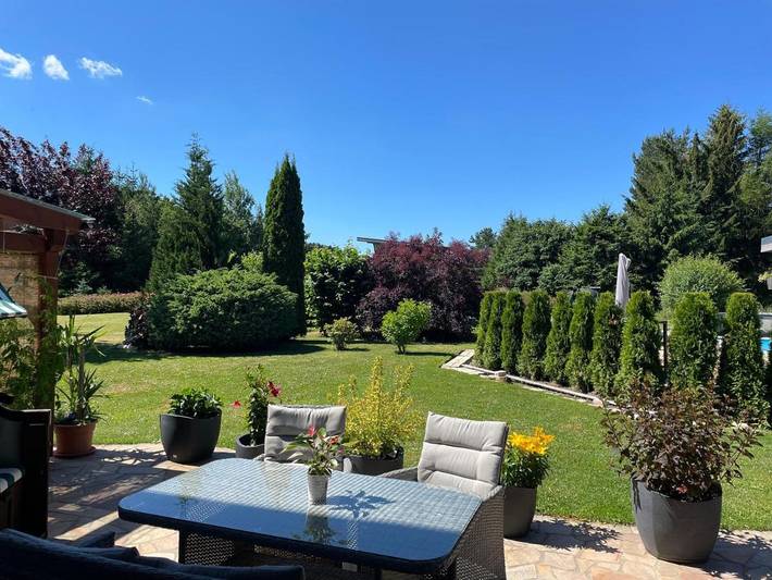 Ferienwohnung für 3 Personen, mit Terrasse und Garten sowie Ausblick