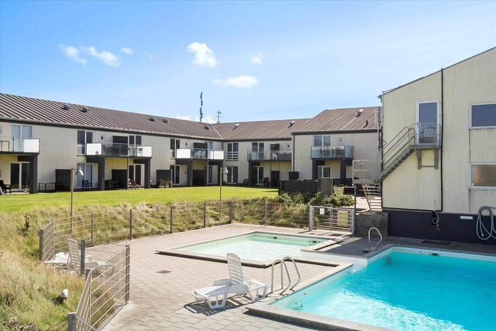 Ferienwohnung für 4 Personen, mit Pool und Balkon in Løkken