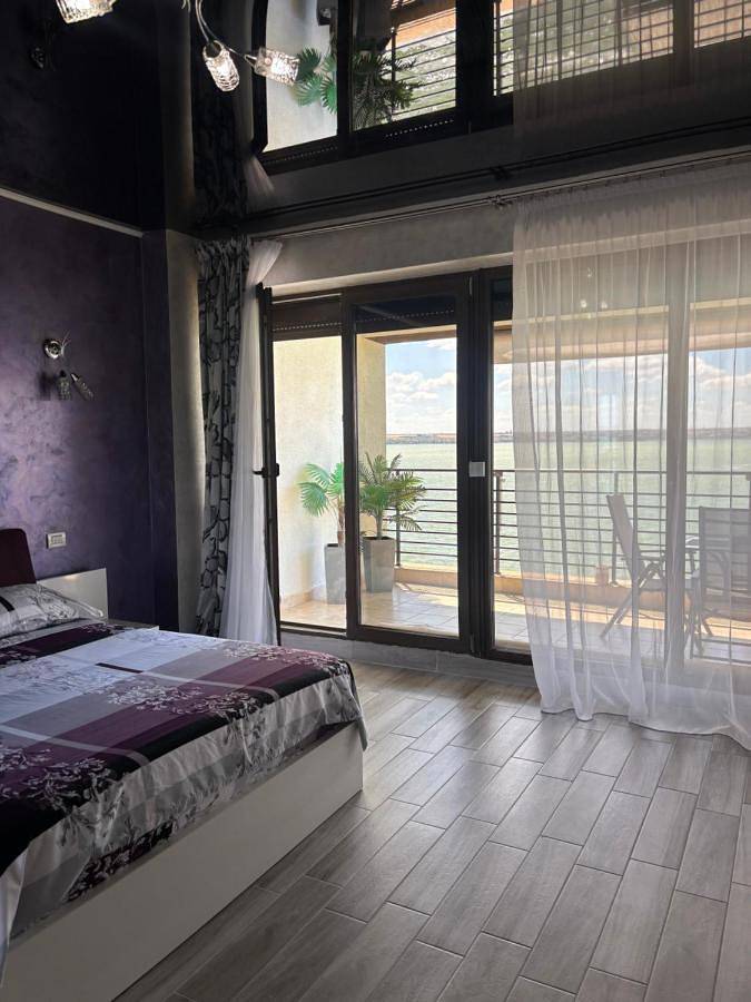 Appartement de vacances pour 4 personnes, avec balcon ainsi que vue sur le lac et vue