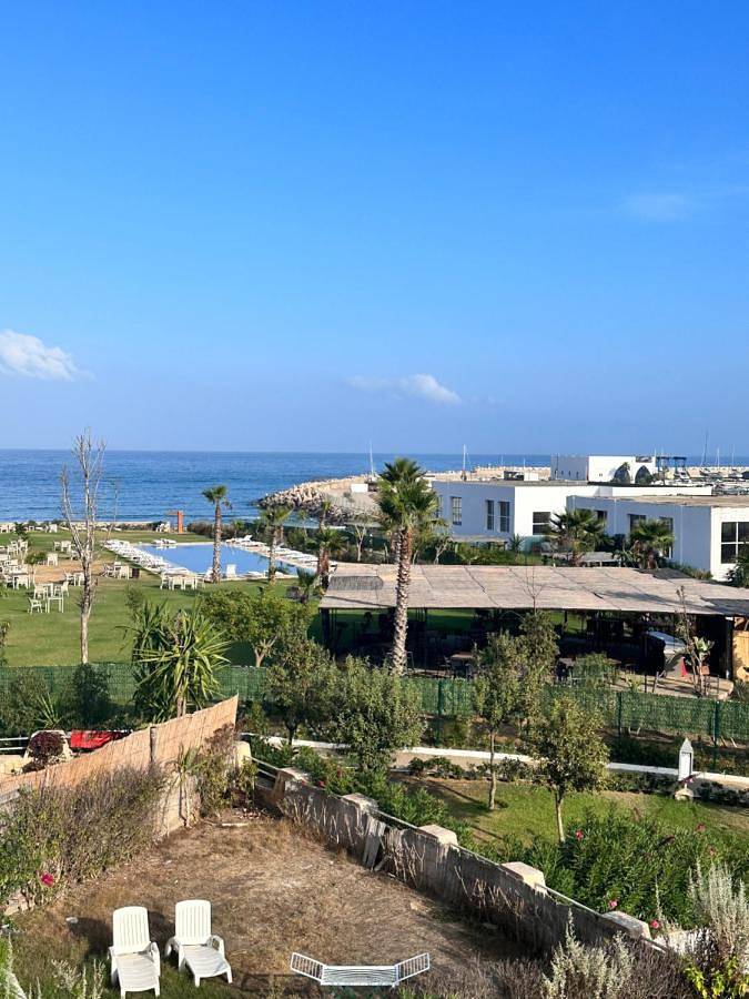 Appartement de vacances pour 4 personnes, avec piscine ainsi que balcon et vue