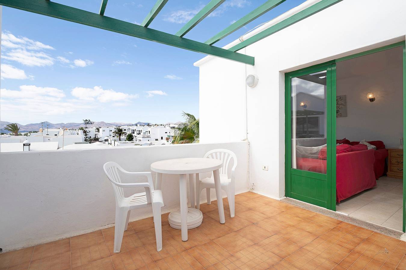 Entire apartment, "Apt6 Las Palmeras Iii Lanzarote" with Sea and Mountain Views, Shared Pool & Private Terrace in Puerto del Carmen, Tías