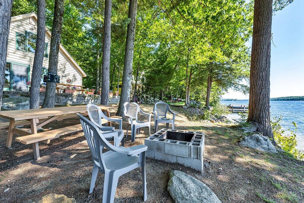 Winnipesaukee Waterfront Chalet with Sandy Beach Private Dock and Fire Pit in Moultonborough, Lake Winnipesaukee