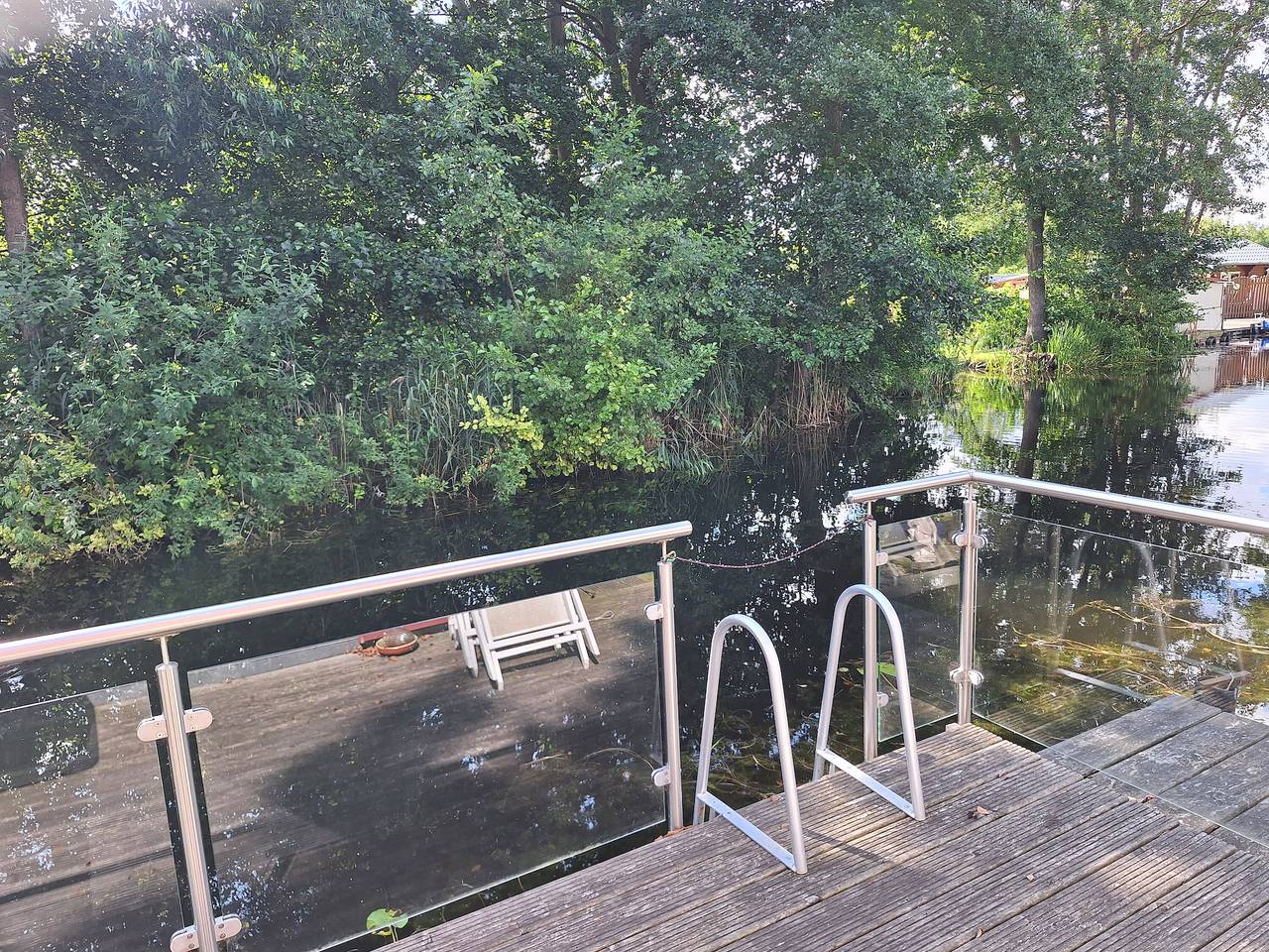 Ferienhaus 'Am Wasser, Bootshaus' mit privater Terrasse in Güstrow, Mecklenburgische Seenplatte