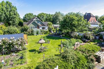 Apartment Klein Bullerbü in Schülp an der Nordsee mit gemeinsamer Terrasse, Garten und WLAN
