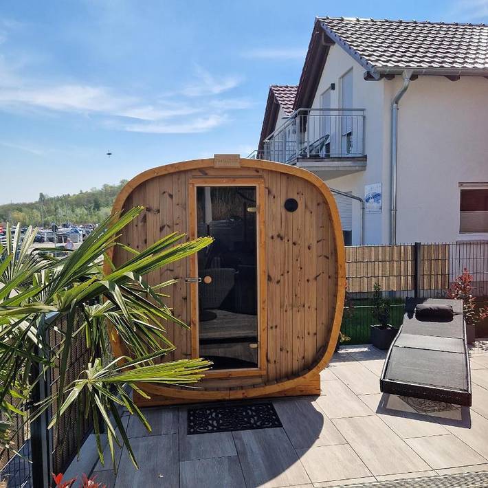 Ferienhaus für 6 Personen, mit Garten und Ausblick sowie Seeblick und Sauna, kinderfreundlich in Mücheln (Geiseltal) - 2
