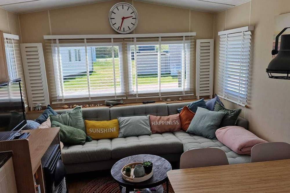 2 minuten van het strand! Stacaravan Duingras Ameland in Nes, Nederlandse waddeneilanden