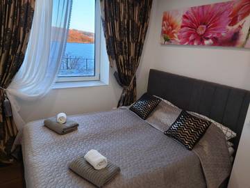 Ferienwohnung für 4 Personen, mit Garten und Ausblick sowie Seeblick in Bergen