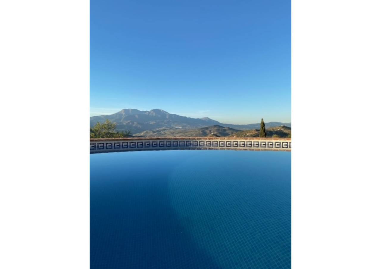 Cottage "Casita soleggiata in collina a Guaro" con vista sulle montagne in Guaro, Sierra de las Nieves