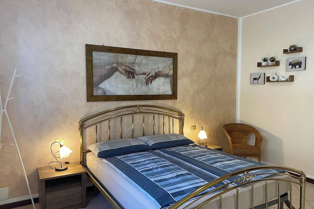 Groot huis, tuin, 5 personen, 200m van het meer / strand in Anfo, Garda Bergen