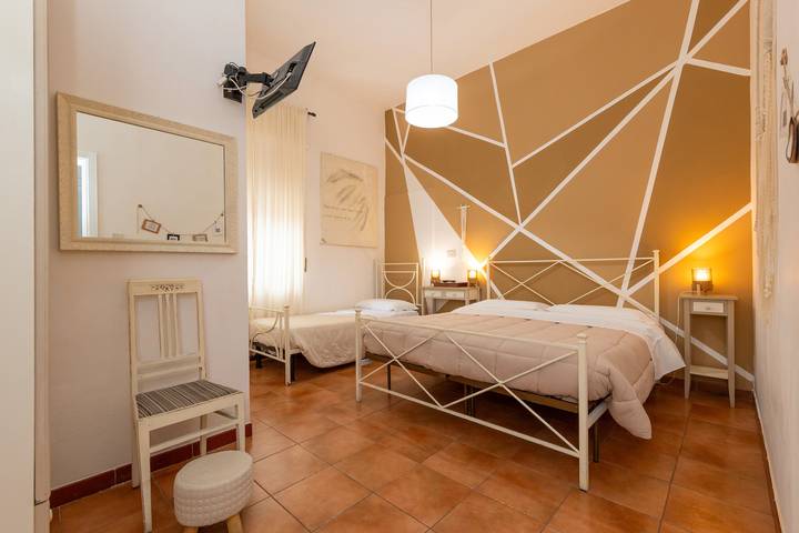 Rom for 3 personer, med hage i Toscana