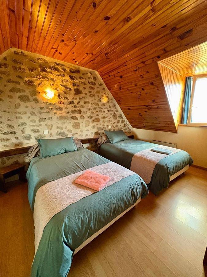 Single Bed in Dormitory Room in Golinhac, Aveyron