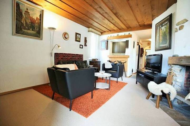 Ferienwohnung für 4 Personen, mit Balkon und Garten sowie Pool und Sauna in Davos