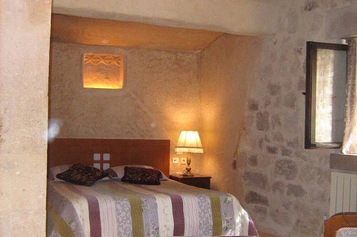 Cave accommodation in Cappadocia with stunning views over valleys and Mt. Argeus in Uçhisar, Nevşehir