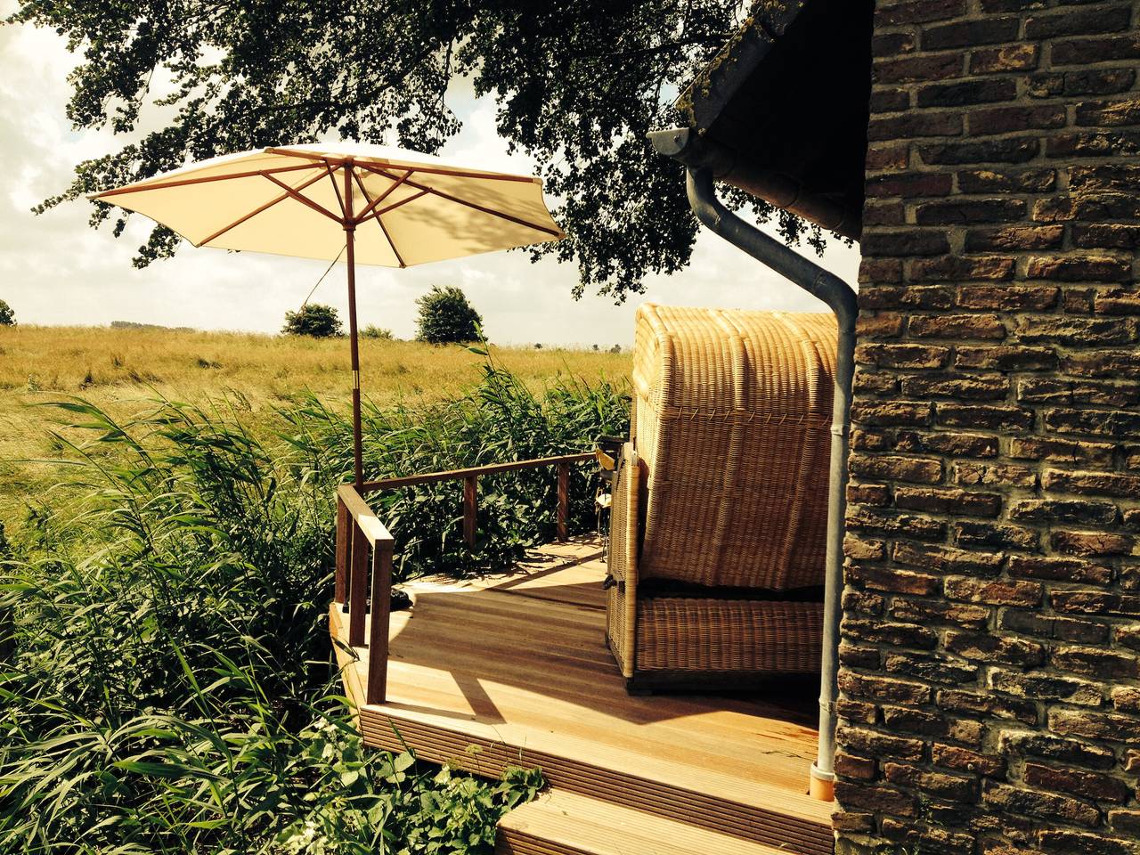 Casa de vacaciones 'Feriencottage Nordseeluft' con terraza privada, jardín comunitario y wifi in Eiderstedt