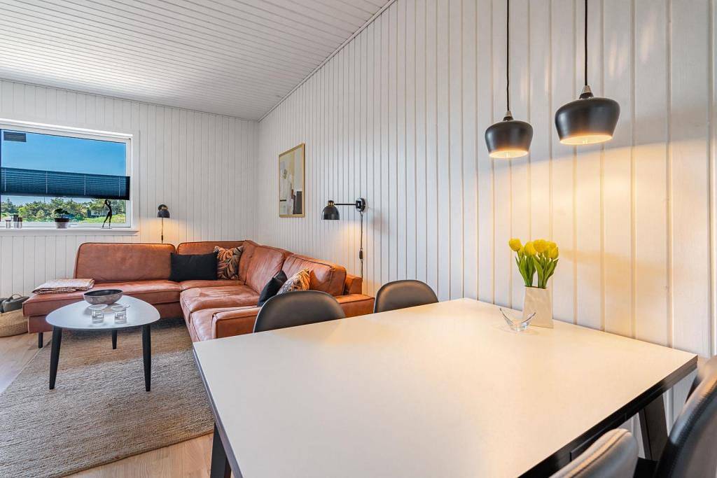 Gemütliche kleine Bungalowwohnung mit großer geschlossener Südterrasse. in Henne, Varde en omgeving
